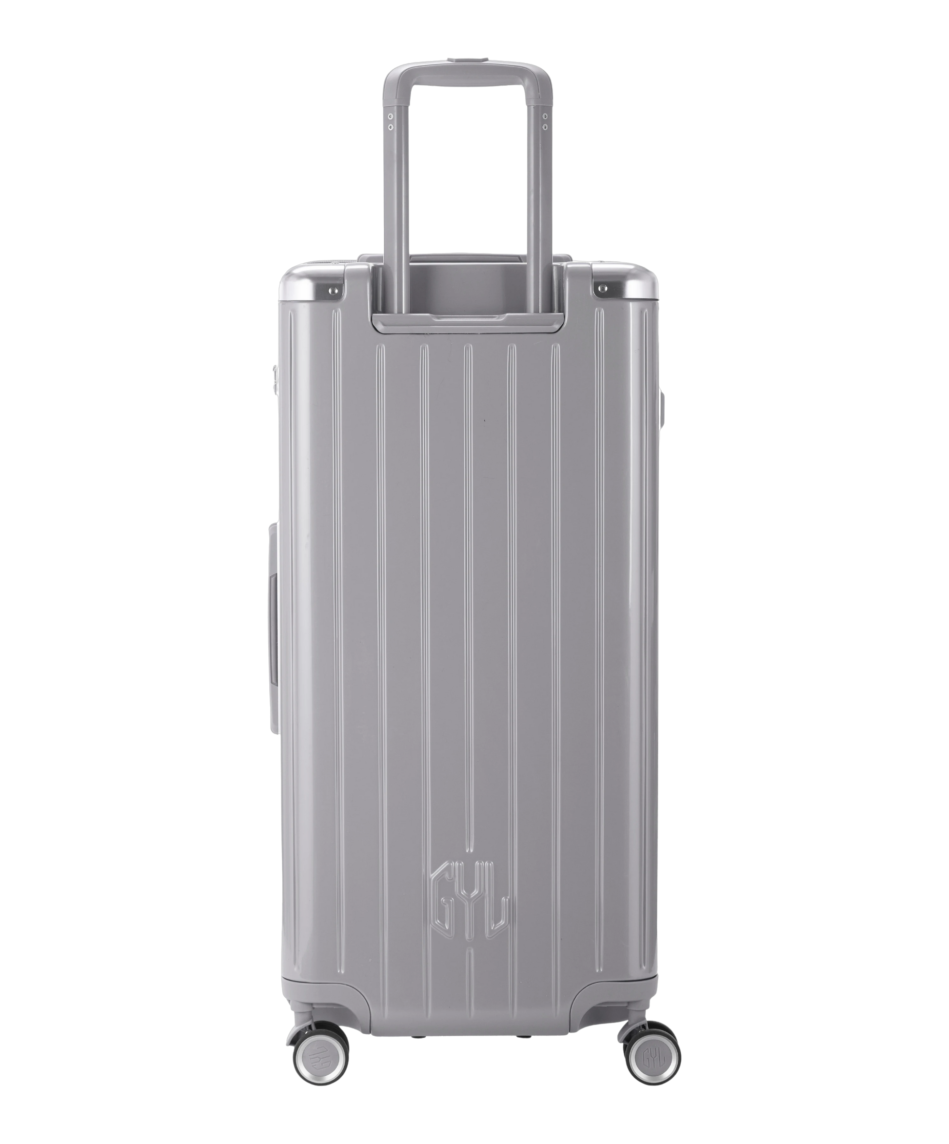 Valise Trunk XL Intemporelle GYL en polycarbonate 78 cm coloris argent vue de dos avec trolley telescopique deploye