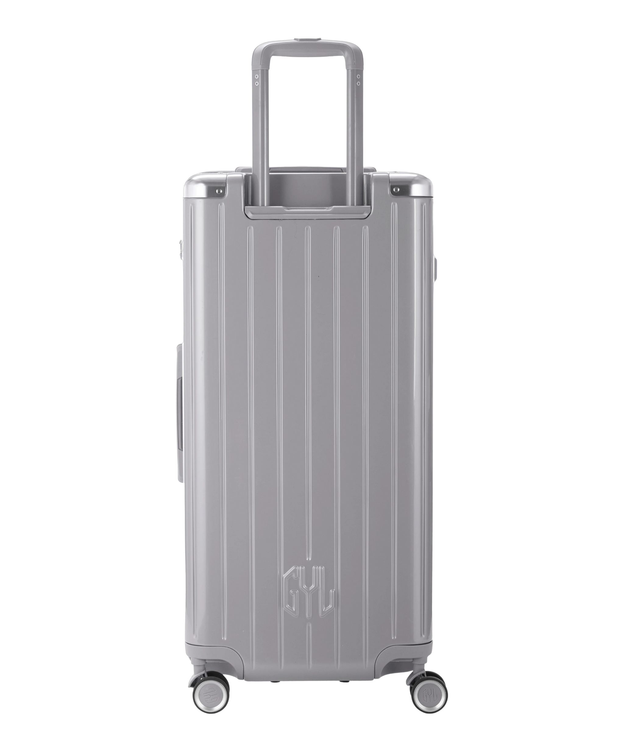Valise Trunk XL Intemporelle GYL en polycarbonate 78 cm coloris argent vue de dos avec trolley telescopique deploye
