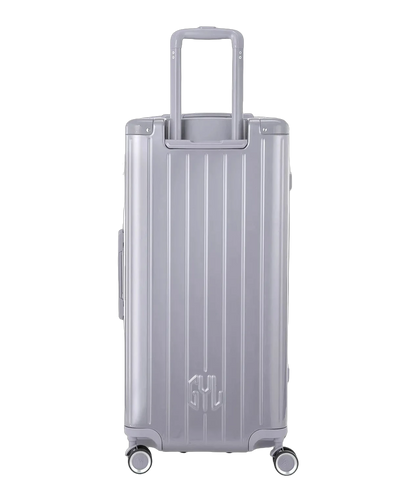 Valise trunk GYL taille XL argent vue de dos avec trolley telescopique deploye