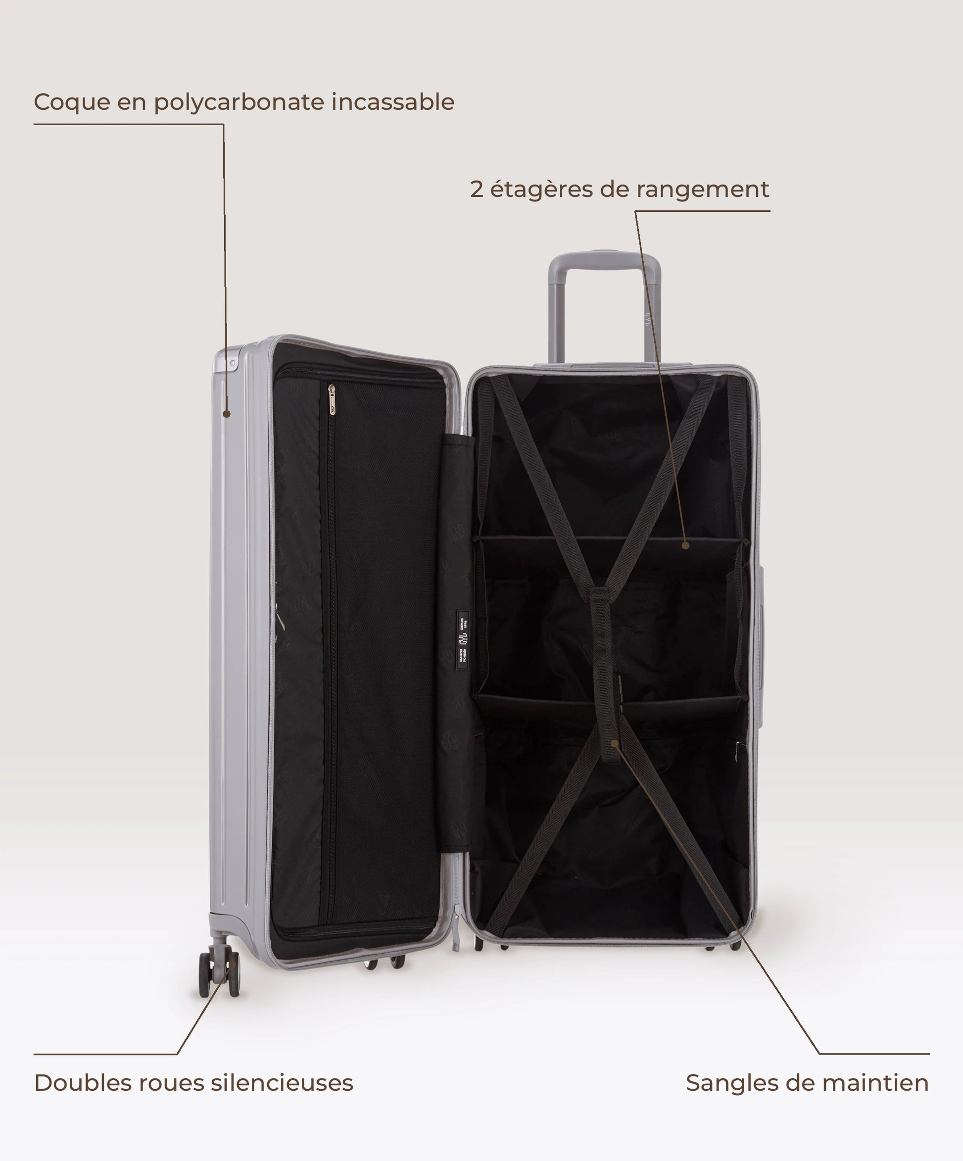 Valise Trunk XL Intemporelle GYL en polycarbonate 78 cm coloris argent, interieur ouvert, 2 etageres de rangement, sangles de maintien, coque en polycarbonate et doubles roues