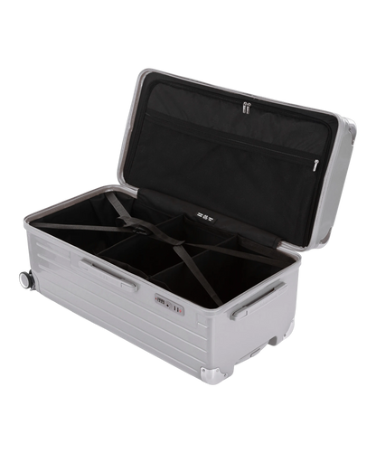 Valise Trunk XL Intemporelle GYL en polycarbonate 78 cm coloris argent interieur ouvert a plat vu de dessus avec separateurs