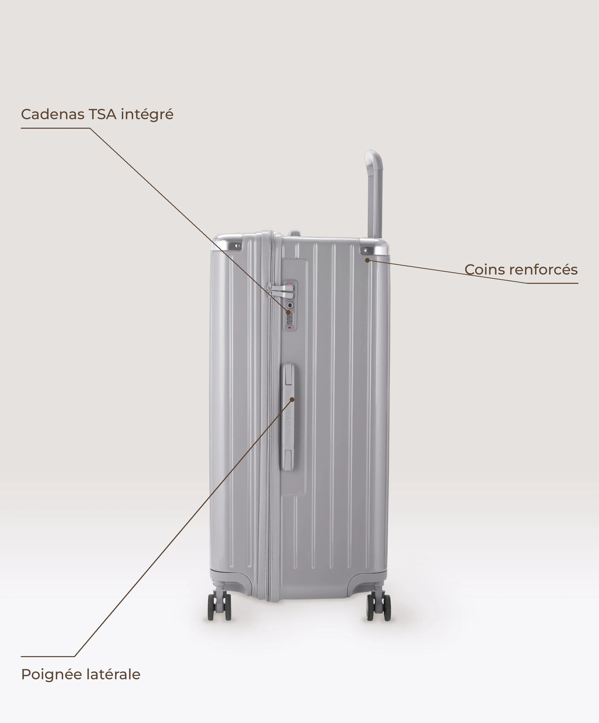 Valise Trunk XL Intemporelle GYL en polycarbonate 78 cm coloris argent, vue de profil, cadenas TSA integre, poignee laterale et coins renforces
