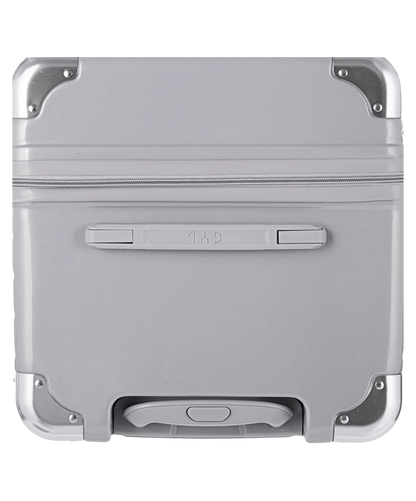 Valise Trunk XL Intemporelle GYL en polycarbonate 78 cm coloris argent vue du dessus avec poignee de portage et coins renforces
