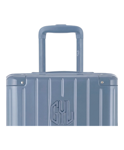 Valise trunk GYL taille XL bleu grise zoom sur la poignee trolley