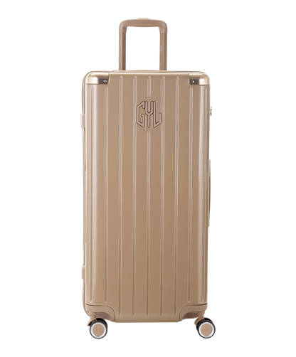 Valise Trunk XL Intemporelle GYL en polycarbonate 78 cm coloris champagne vue de face avec logo GYL en relief