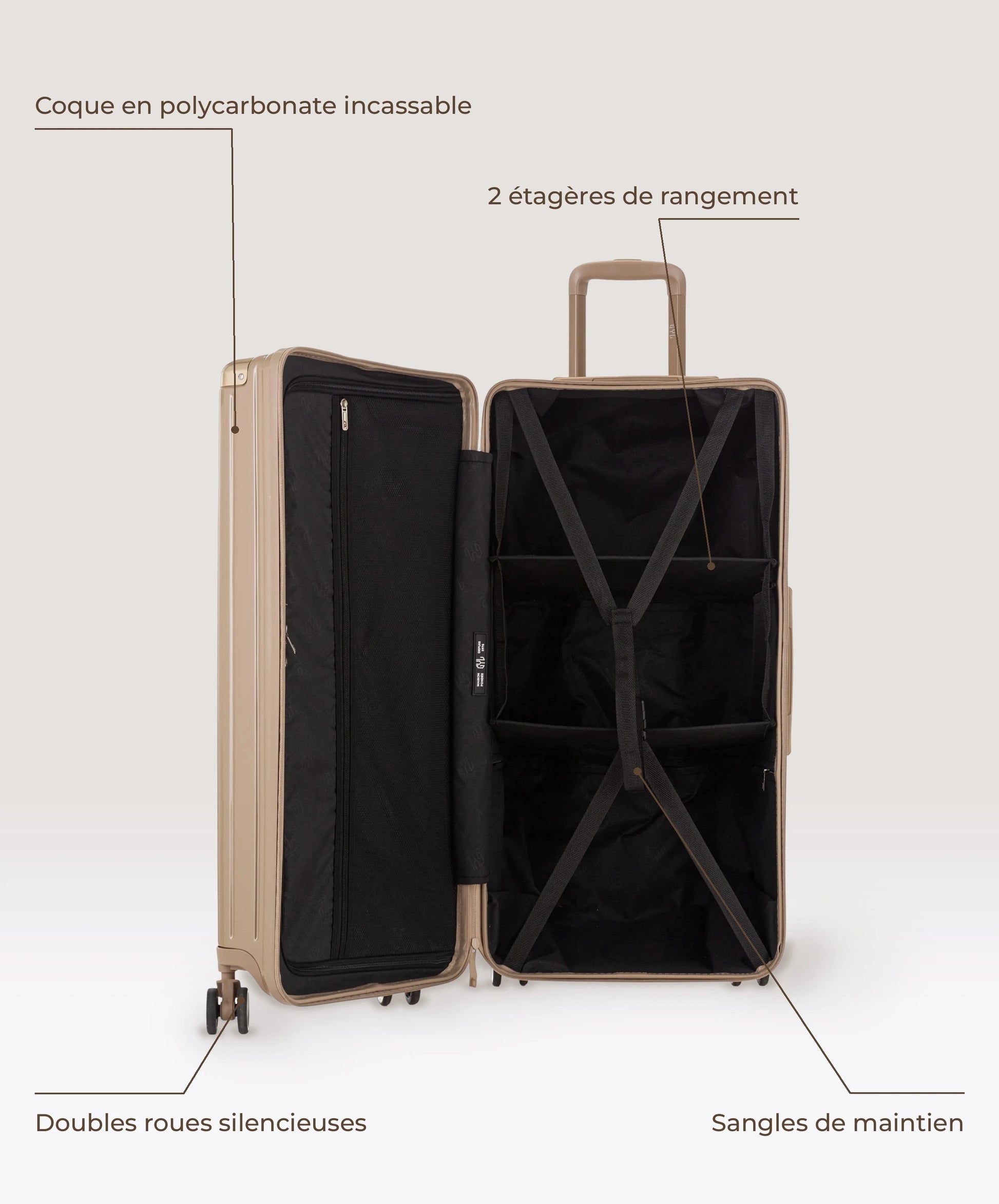 Valise Trunk XL Intemporelle GYL en polycarbonate 78 cm coloris champagne, interieur ouvert, 2 etageres de rangement, sangles de maintien, coque en polycarbonate et doubles roues