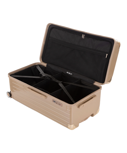 Valise Trunk XL Intemporelle GYL en polycarbonate 78 cm coloris champagne interieur ouvert a plat vu de dessus avec separateurs