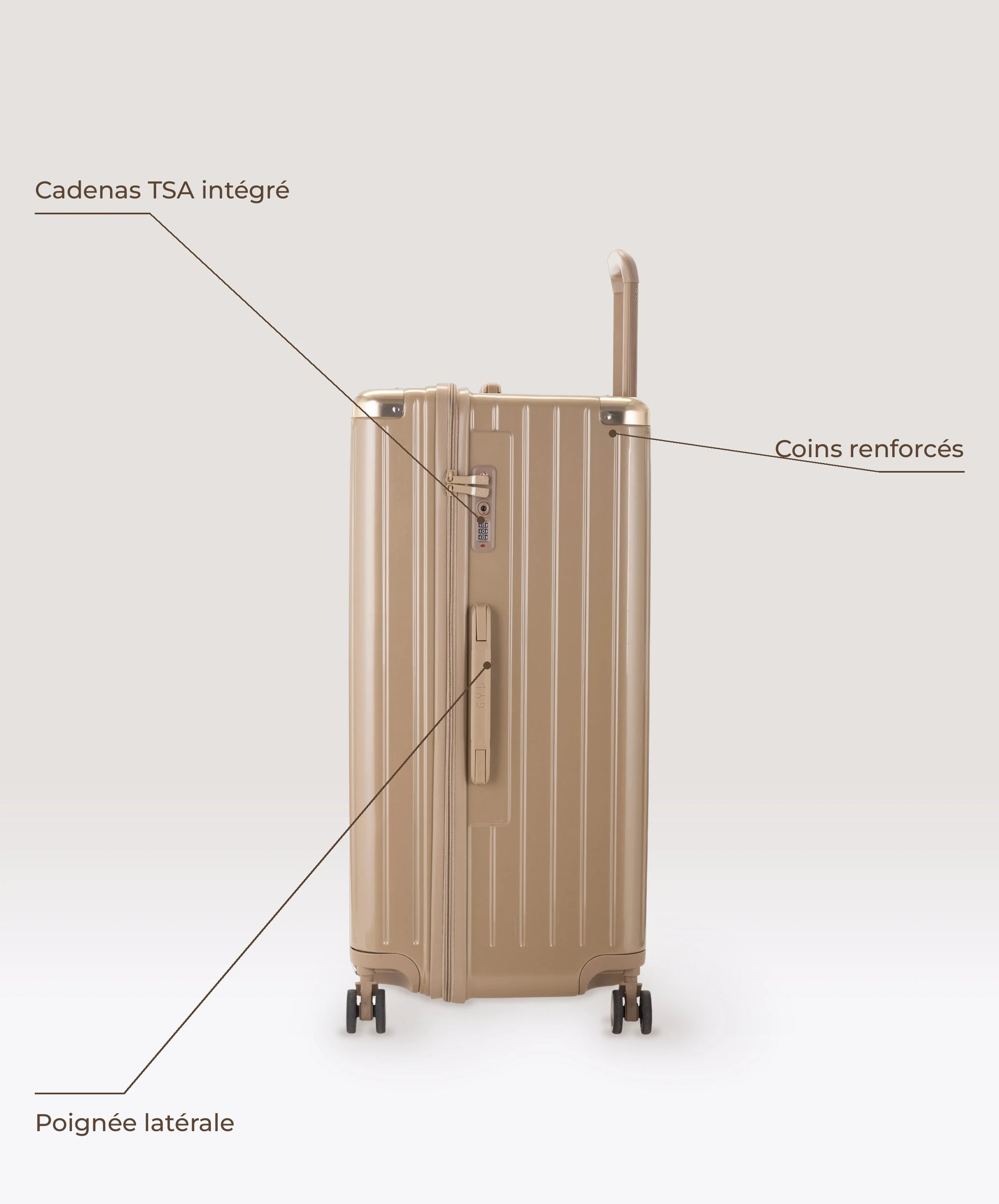 Valise Trunk XL Intemporelle GYL en polycarbonate 78 cm coloris champagne, vue de profil, cadenas TSA integre, poignee laterale et coins renforces