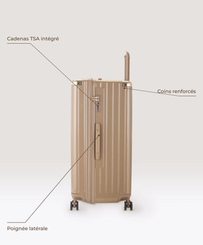 Valise Trunk XL Intemporelle GYL en polycarbonate 78 cm coloris champagne, vue de profil, cadenas TSA integre, poignee laterale et coins renforces