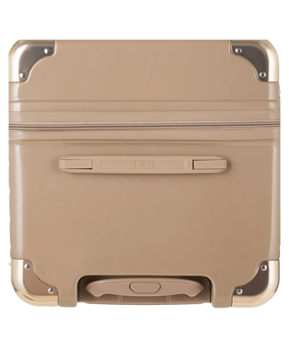 Valise Trunk XL Intemporelle GYL en polycarbonate 78 cm coloris champagne vue du dessus avec poignee de portage et coins renforces