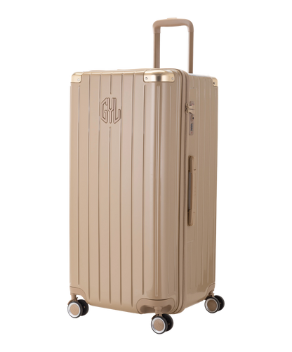 Valise Trunk GYL en polycarbonate Trunk XL 80 cm coloris champagne vue trois quarts avant