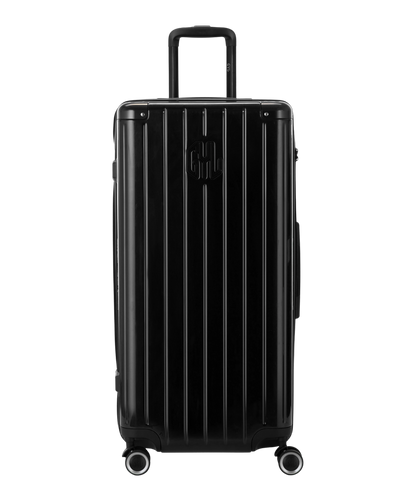Valise Trunk XL Intemporelle GYL en polycarbonate 78 cm coloris noir vue de face avec logo GYL en relief