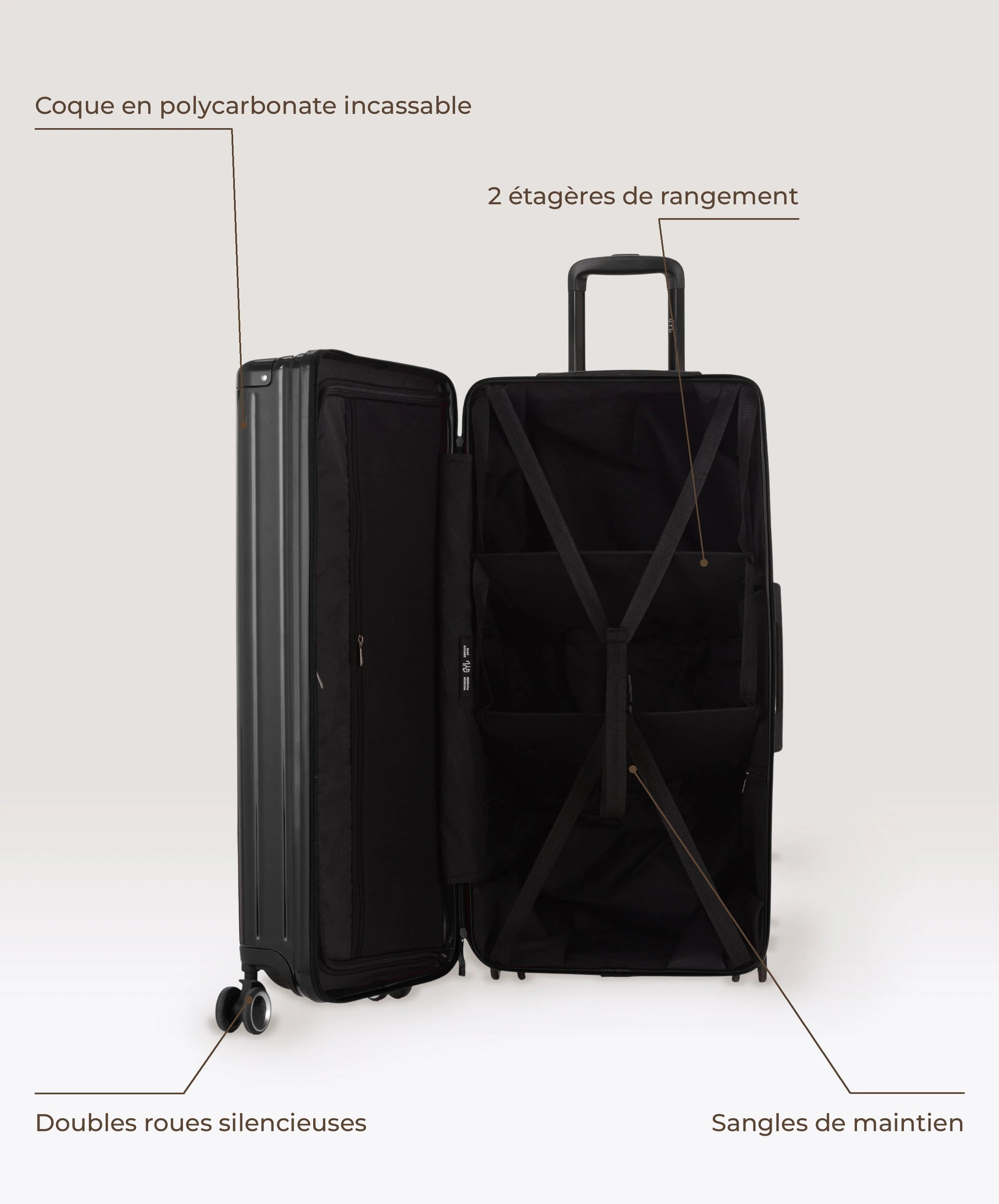 Valise Trunk XL Intemporelle GYL en polycarbonate 78 cm coloris noir, interieur ouvert, 2 etageres de rangement, sangles de maintien, coque en polycarbonate et doubles roues