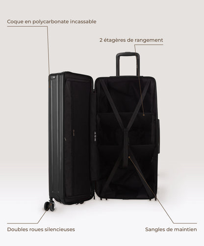 Valise Trunk XL Intemporelle GYL en polycarbonate 78 cm coloris noir, interieur ouvert, 2 etageres de rangement, sangles de maintien, coque en polycarbonate et doubles roues