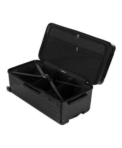Valise Trunk XL Intemporelle GYL en polycarbonate 78 cm coloris noir interieur ouvert a plat vu de dessus avec separateurs