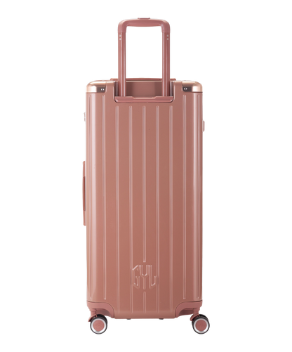 Valise Trunk XL Intemporelle GYL en polycarbonate 78 cm coloris rose gold vue de dos avec trolley telescopique deploye