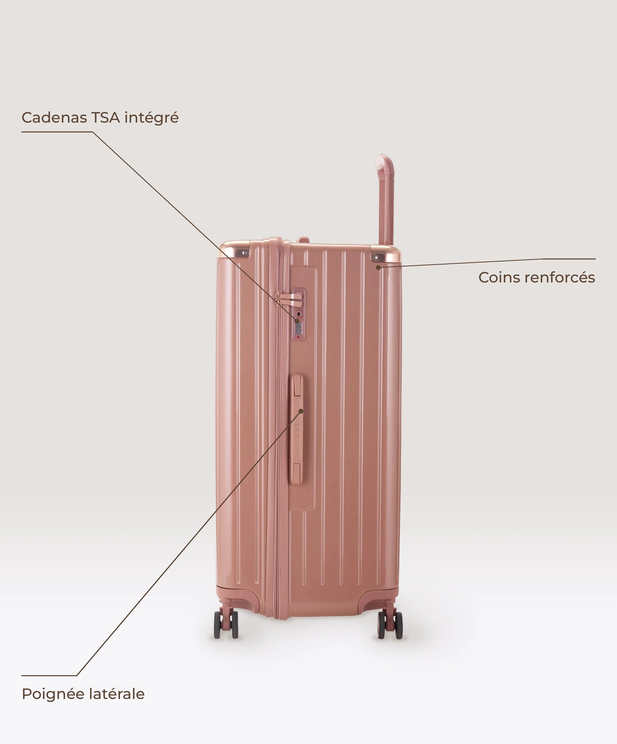 Valise Trunk XL Intemporelle GYL en polycarbonate 78 cm coloris rose gold, vue de profil, cadenas TSA integre, poignee laterale et coins renforces