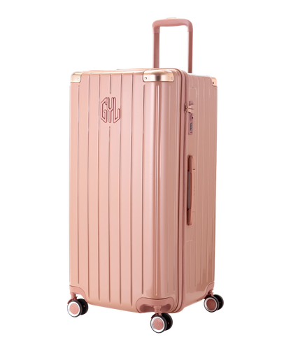 Valise Trunk XL Intemporelle GYL en polycarbonate 78 cm coloris rose gold vue trois quarts avant