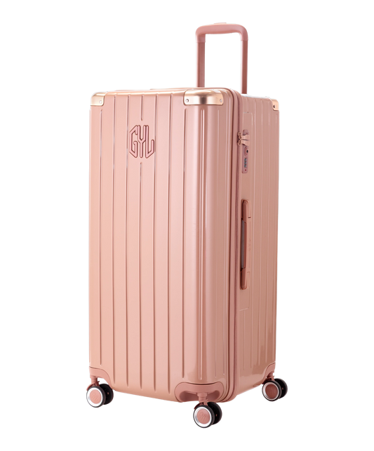 Valise Trunk XL Intemporelle GYL en polycarbonate 78 cm coloris rose gold vue trois quarts avant