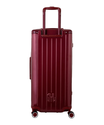 Valise trunk GYL taille XL rouge fonce vue de dos avec trolley telescopique deploye