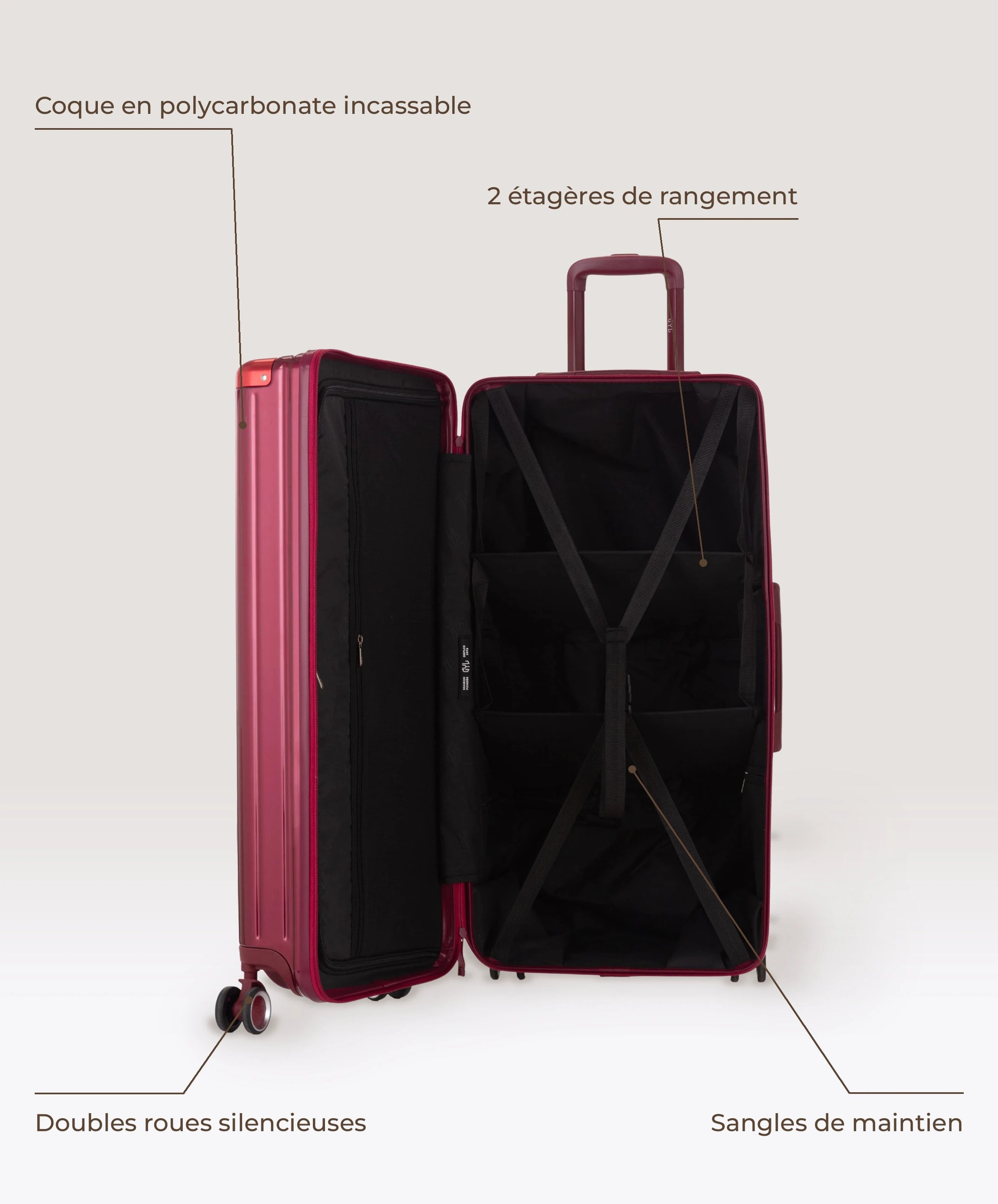 Valise Trunk XL Intemporelle GYL en polycarbonate 78 cm coloris rouge fonce, interieur ouvert, 2 etageres de rangement, sangles de maintien, coque en polycarbonate et doubles roues