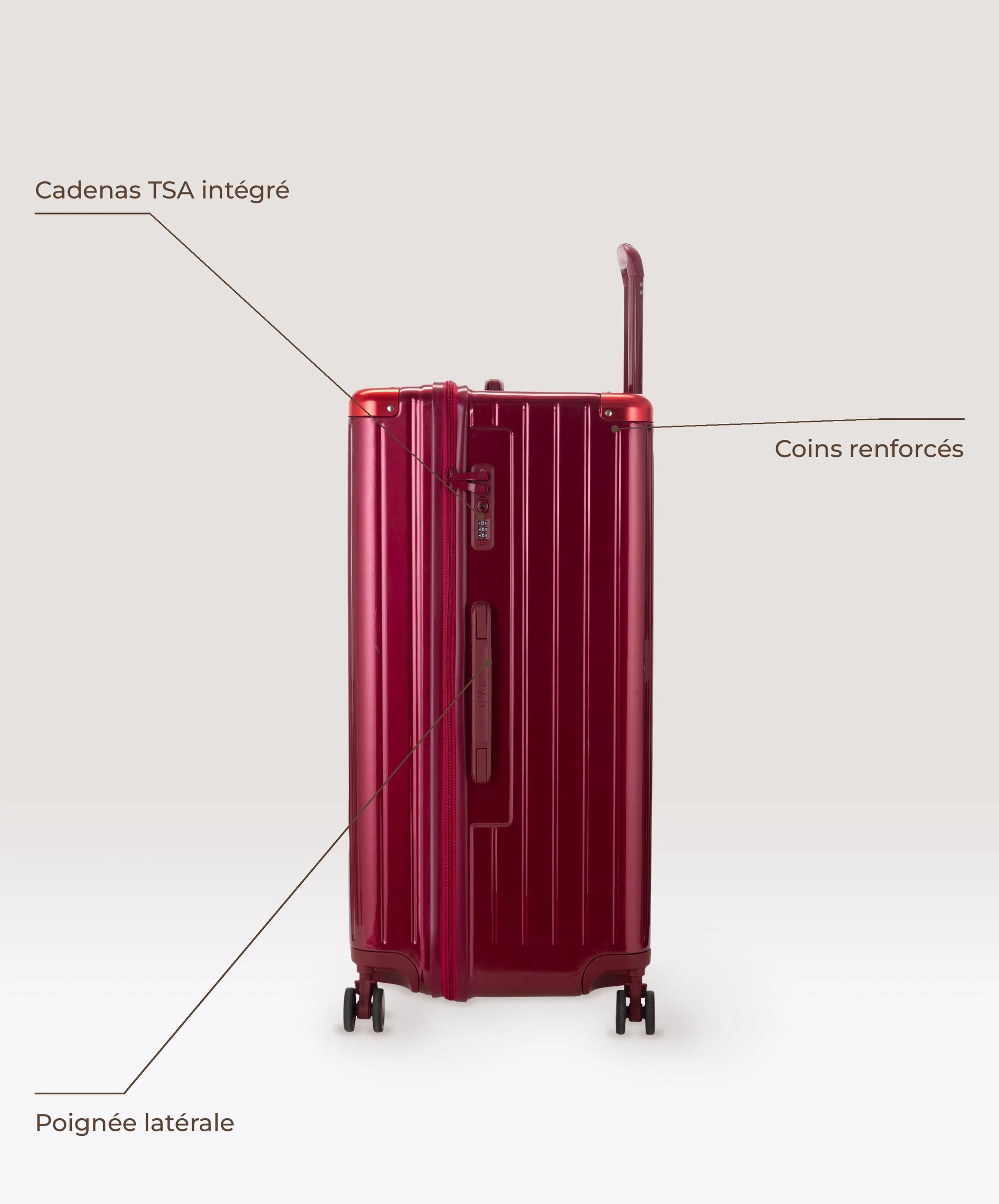 Valise Trunk XL Intemporelle GYL en polycarbonate 78 cm coloris rouge fonce, vue de profil, cadenas TSA integre, poignee laterale et coins renforces